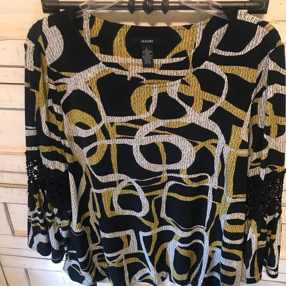 Alfani blouse with fathered bottom and lace sleeves